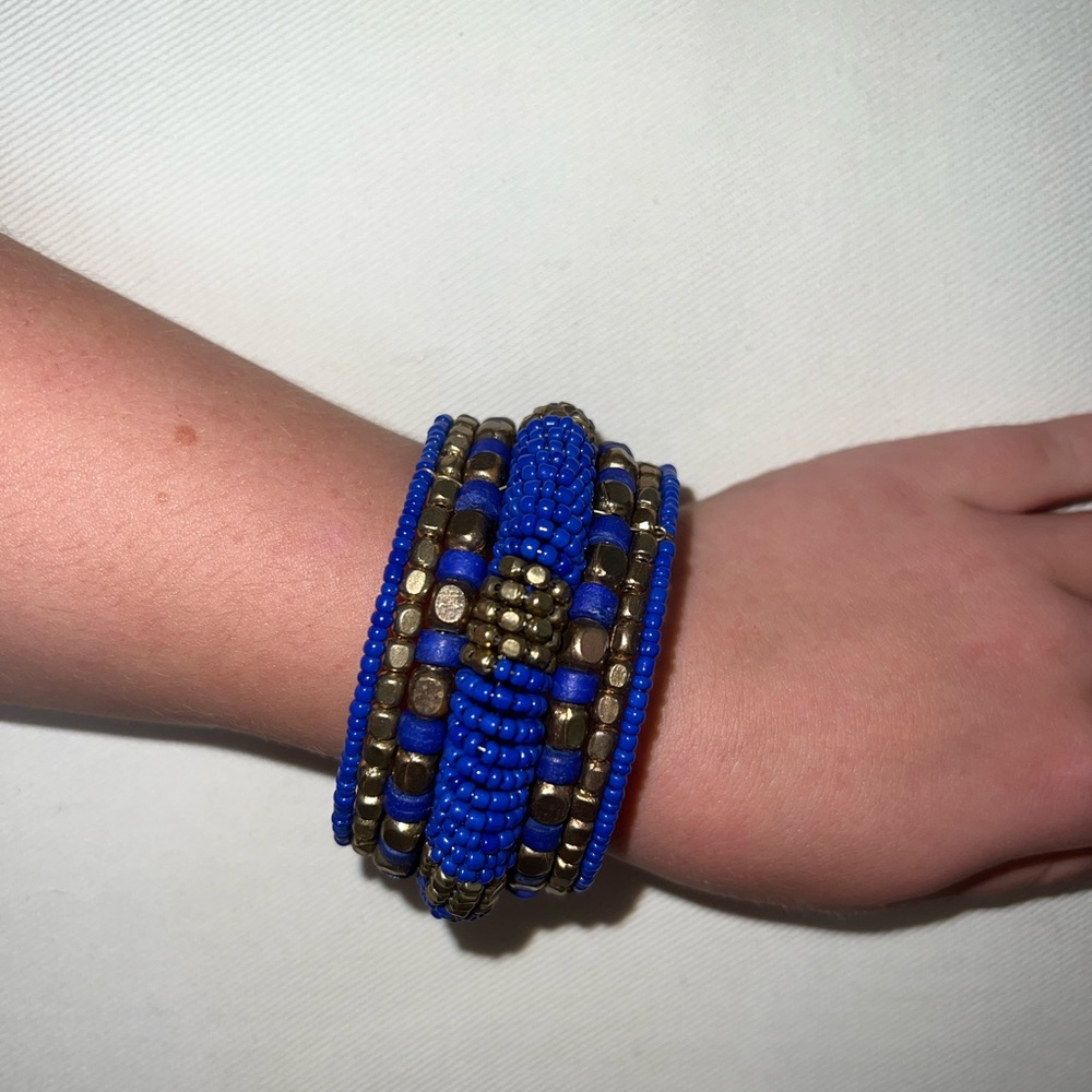 Adjustable gold and blue bead cuff